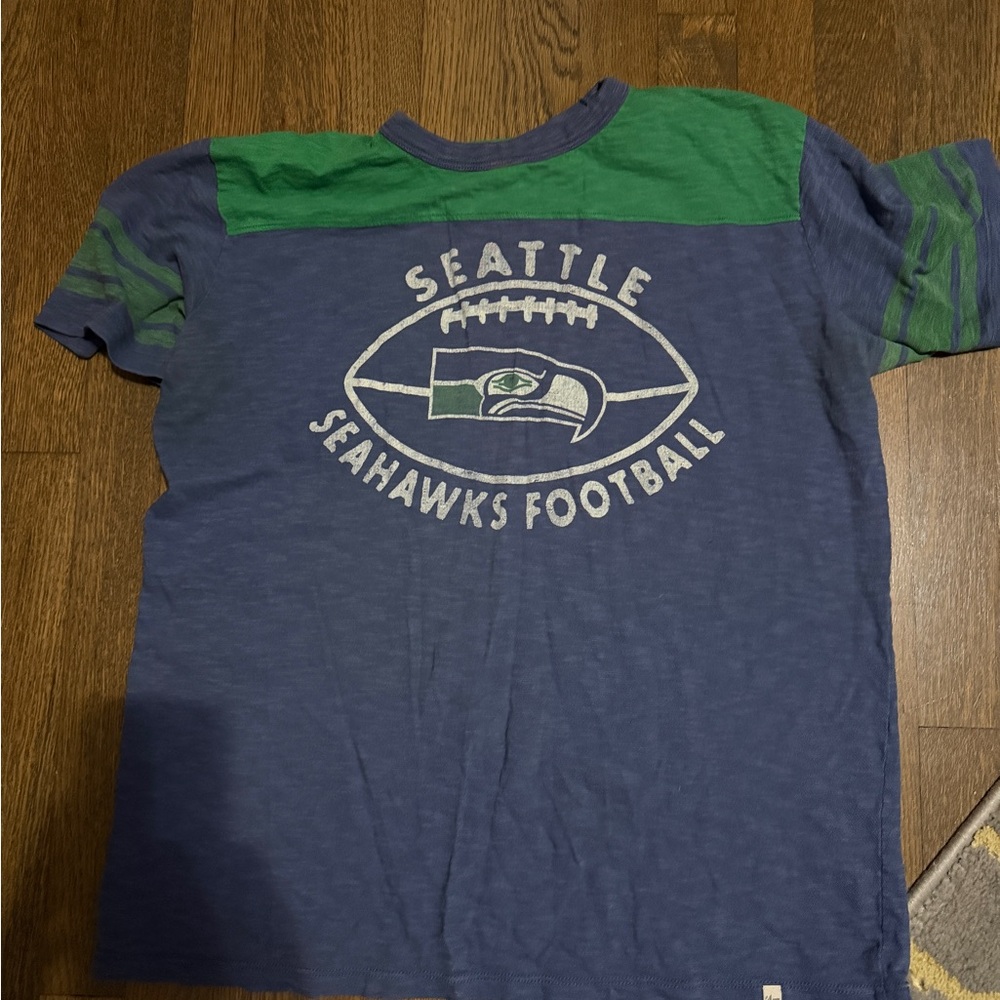 Seattle Seahawks Men's Blue and Green Short Sleeve Tee

MAKE AN OFFER